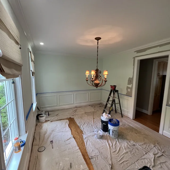 Ceiling and crown molding mid-repaint in a Central Connecticut dining room